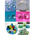 juguete redondo al por mayor canicas de vidrio de porcelana de diferentes colores